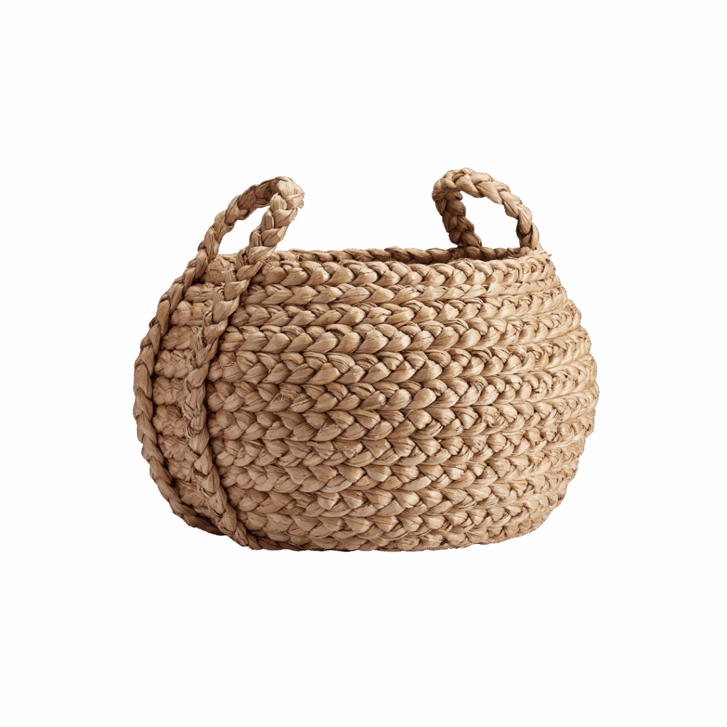 Round, woven basket with two handles made from natural, light brown fibers—perfect for hosting and serving essentials—set against a plain white background.